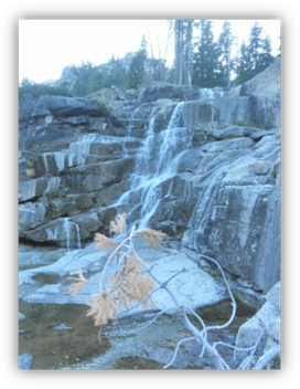 A waterfall in a rocky area